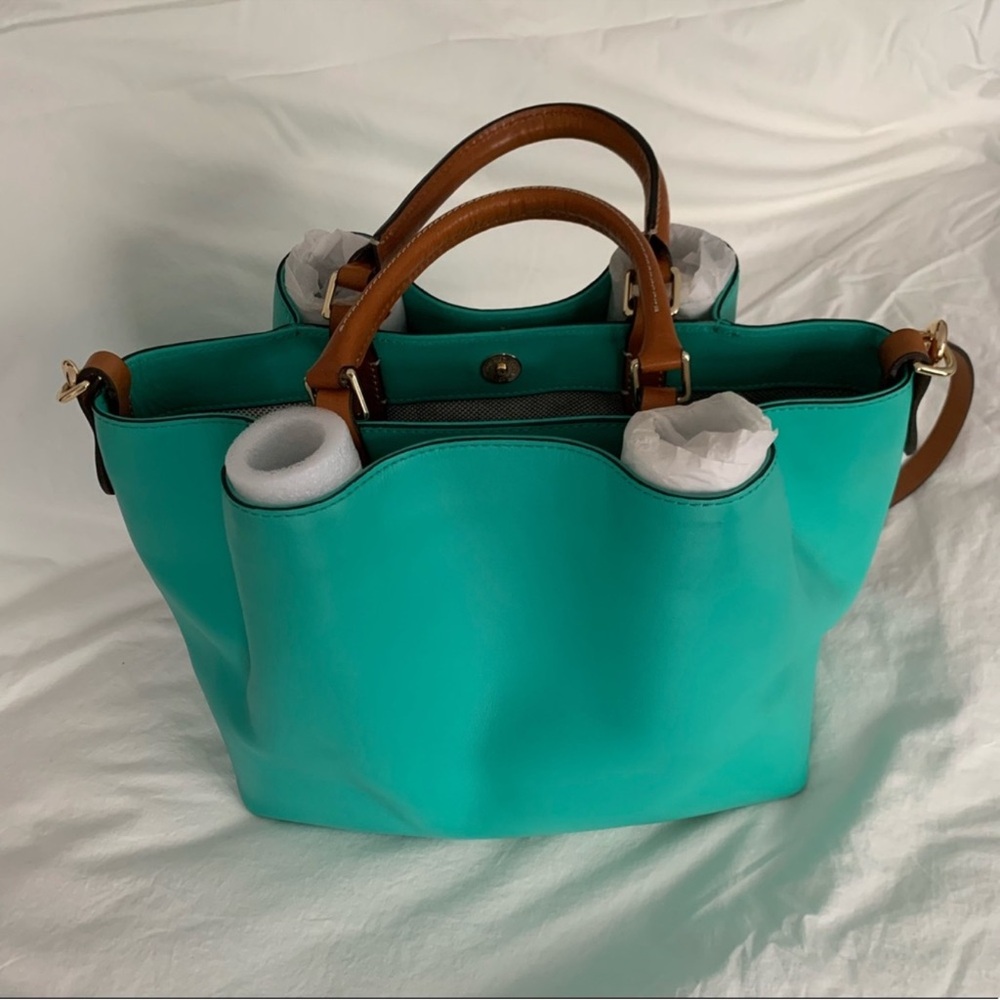 Dooney & Bourke southwest Turquoise Barlow purse
Like New !!!!!! SALE!!!!!!! - Picture 4 of 11